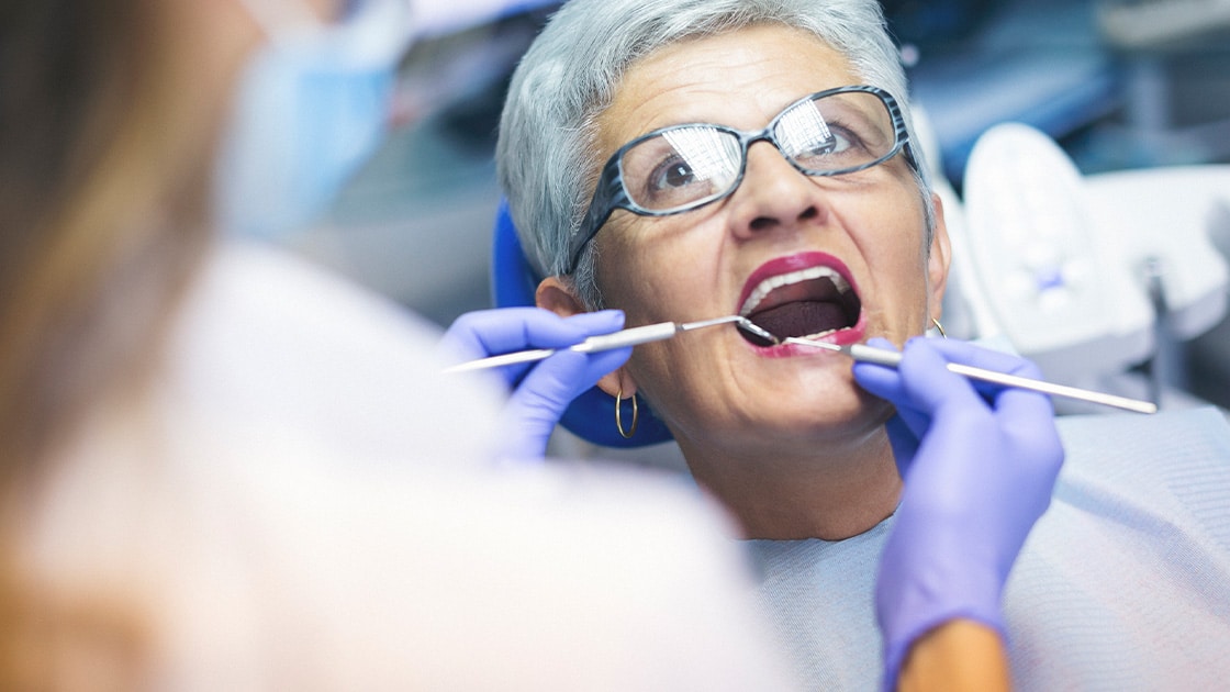 Older Lady In Dental Chair